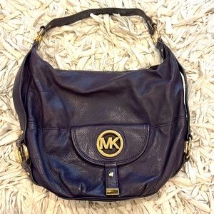 Michael Kors purple with gold hardware purse